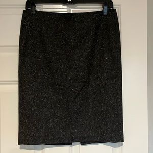 Marciano grey wool blend pencil skirt, black lining, back zipper & slit, size 4